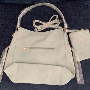 Purse, Handbag Roomy Multiple Pockets Special Carry Sides For Your Bang😉.